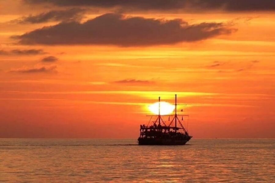Alanya Sunset Boat: Foam Party & Dinner & Swimming Stops - Red Tower and Old Shipyard Swim Stop: History Meets the Sea