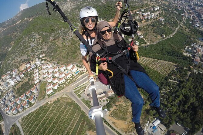 Halal Tandem Paragliding With Licensed Woman Pilot in Alanya - Tandem setup: what you’re doing (and not doing) midair