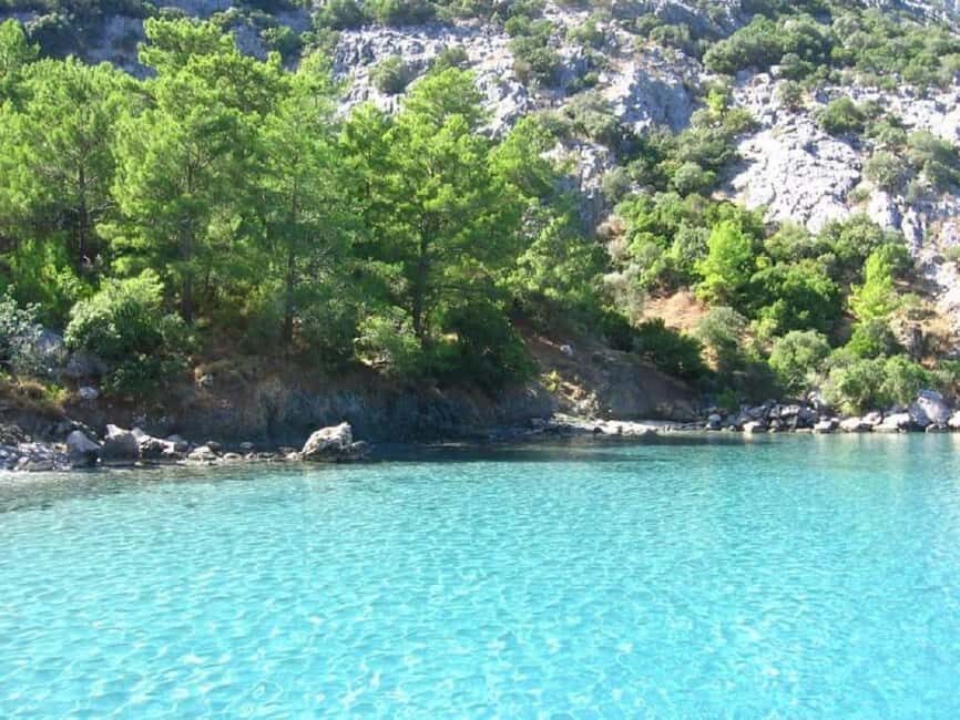 Kemer Porto Genoese-Sazak Bays Boat Trip With Mud Baths - Porto Genoese: Fortress Remnants and a Sea-View History Stop