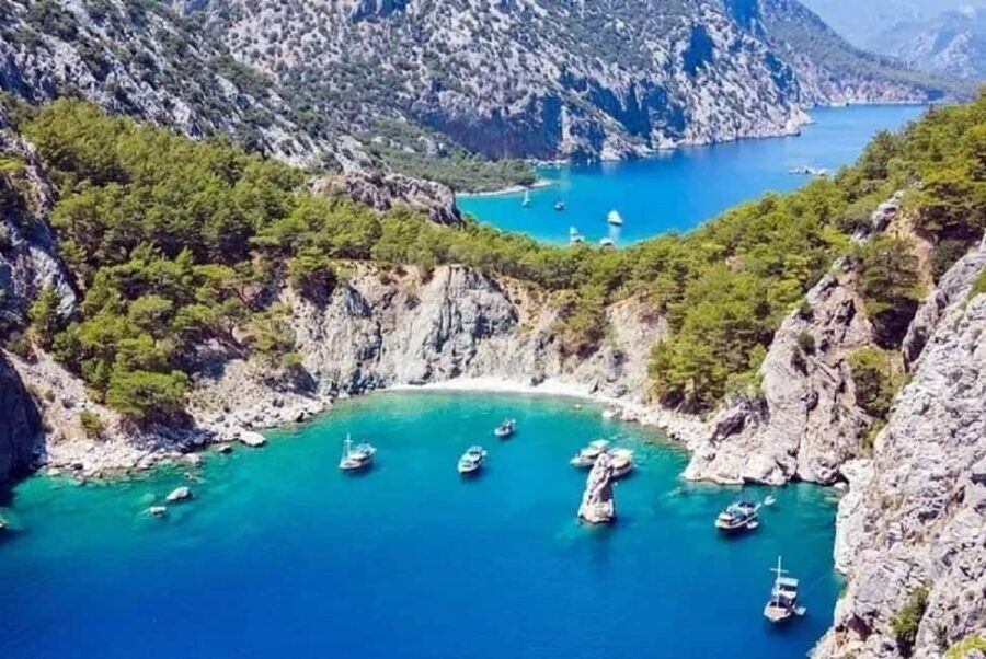 Kemer Porto Genoese-Sazak Bays Boat Trip With Mud Baths - Sazak Bay’s Swim Zone: Clear Water, Grotto Passes, and Snorkel Time