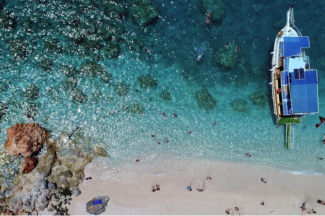 Suluada Boat Tour From Antalya (Maldives of Turkey) with Lunch & Hotel Transfer - Suluada Island: turquoise water, long swim time, and rocky feet tips